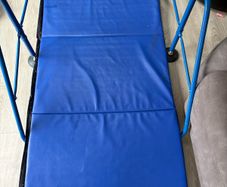 Gymnastics bar and mat for child up to age 8.