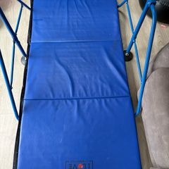 Gymnastics bar and mat for child up to age 8.
