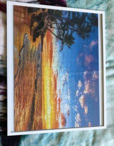 Puzzle in glass frame
