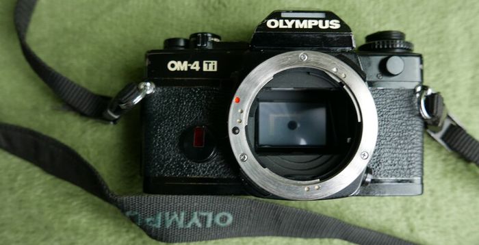Olympus OM-4Ti Black 35mm SLR Film Camera Titan Body JAPAN and Vivitar series 1 28-90mm F2.8-3.5  FD mount lens