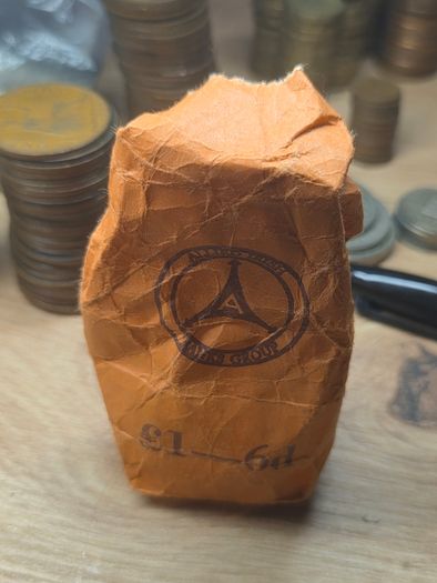Bank bag of 6d coins