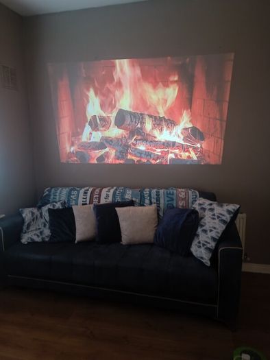 philips neopix ultra 2tv+ home projector and height adjustable stand, built in speakers and android TV with play store stand comes with power point bracket on it as seen in pictures also remote and phone holder