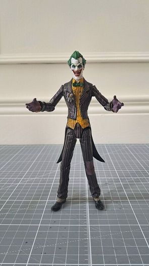 DC Direct Arkham Joker figure w/ custom head sculpt