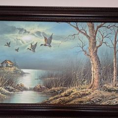 Painting of mallards in flight
