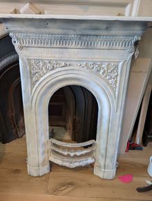 Antique cast metal fireplace