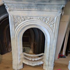 Antique cast metal fireplace