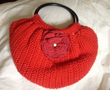 Handmade crochet bags hats and other items