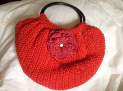 Handmade crochet bags hats and other items