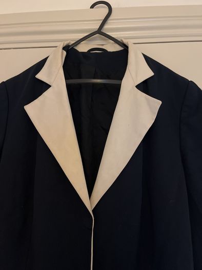Black and cream coat