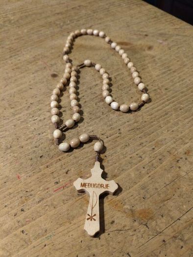 handmade wooden rosary from Medjugorje featuring a cross with the town's name engraved on it. New never used