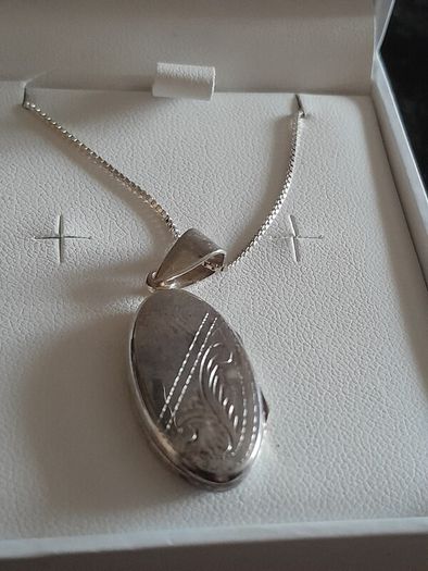 silver chain and locket