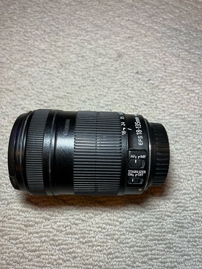 Canon 100D DSLR Camera and Canon EF-S 18-135mm IS Lens