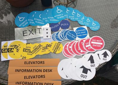 Hospitality signs and stickers, all new, D18 post 6e