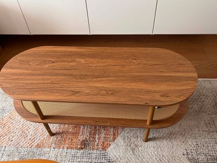 Wooden coffee table with rattan