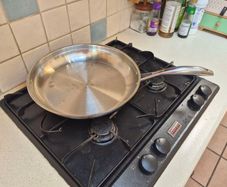 Large stainless steel frying pan
