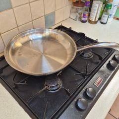 Large stainless steel frying pan