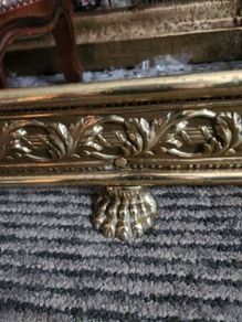 19 th Cent fender on claw feet. Polished