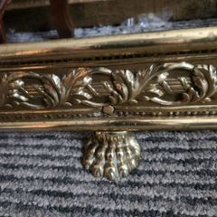 19 th Cent fender on claw feet. Polished