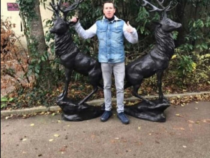 Pair of life size bronze deer statues