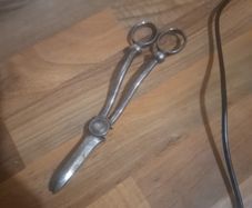 Antique candle snuffer