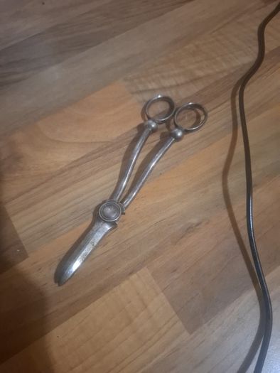 Antique candle snuffer