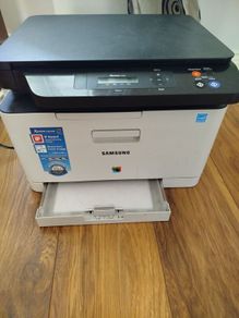 Samsung Xpress colour laser printer and scanner selling with  2 colour toner cartridges