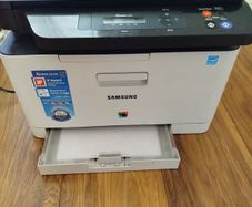 Samsung Xpress colour laser printer and scanner selling with  2 colour toner cartridges