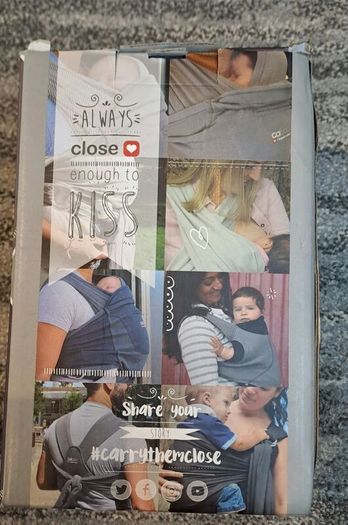 Close Caboo baby carrier