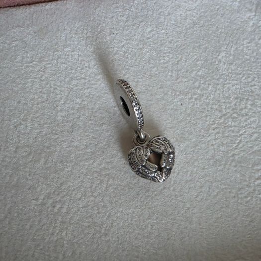 Pandora locket angel wings,with enamel dangle charm very good condition