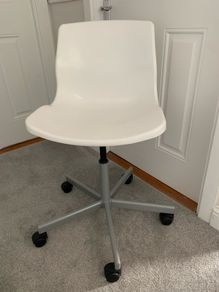 White chair on wheels