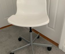White chair on wheels