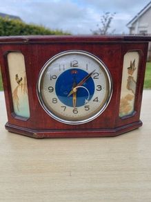 Antique Chinese table clock in a wooden case