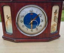 Antique Chinese table clock in a wooden case