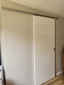Sliding door and rail