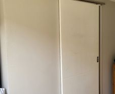Sliding door and rail