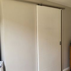 Sliding door and rail