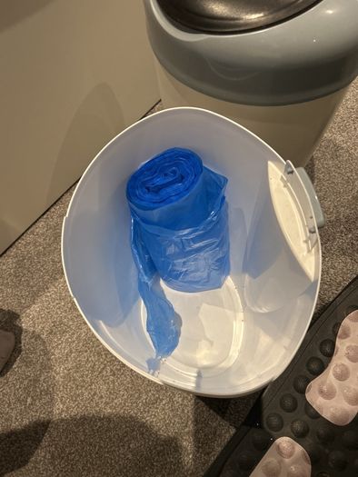 Two Tommy tippee nappy bins