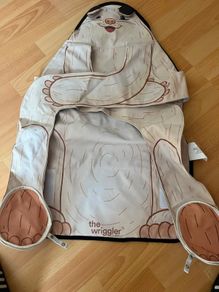 The Wriggler. Baby changing mat. Never used.