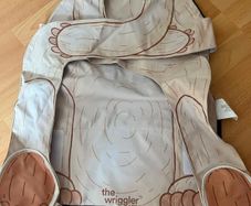 The Wriggler. Baby changing mat. Never used.