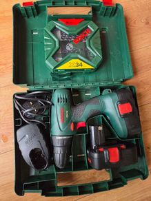 Bosch PSR 18 drill with 2 batteries, charger and brand new bits