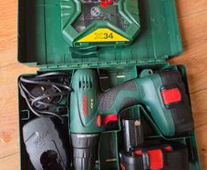 Bosch PSR 18 drill with 2 batteries, charger and brand new bits