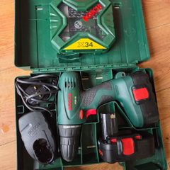 Bosch PSR 18 drill with 2 batteries, charger and brand new bits