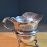 Antique silver cream jug with scalloped rim Image 4