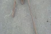 Old cast iron wall mounted hand water pump