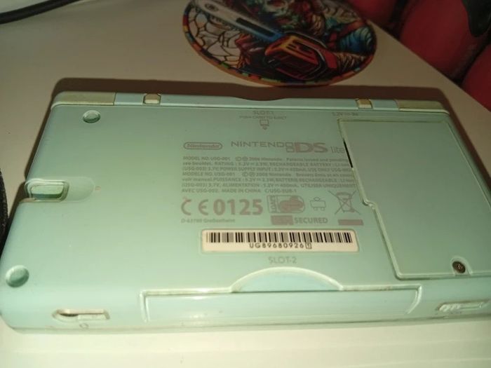 Nintendo ds lite ice blue with flashcard working with minor issues-no charger