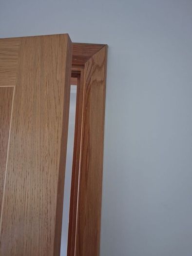 Oak Doors, solid oak frames, architrave and skirting.