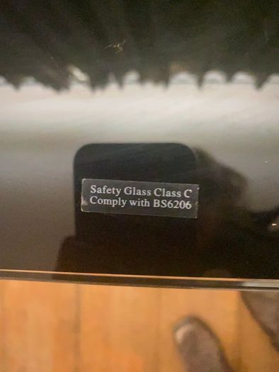 Black glass tv stand