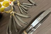 cuttlery knifes forks spoons table / dessert spoons