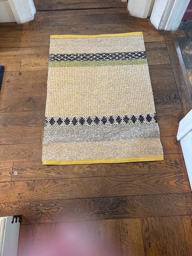 70 by 100 cm polyester rug woven textured finish