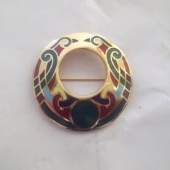 a vintage costume jewellery brooch